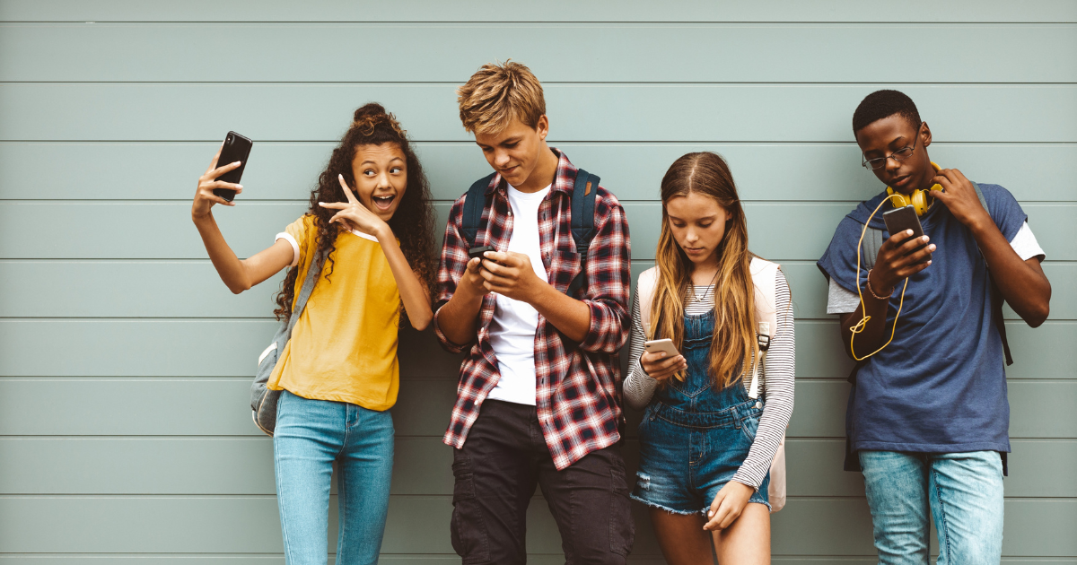 social media bullying, students on phones
